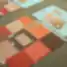 Samples of interior materials and color palettes featuring fabrics, laminates, and finish swatches arranged on a table for creating color combinations.