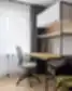 Šiuolaikiška darbo vieta su ergonomine kėde, lentynomis ir natūralios šviesos apšvietimu Balcia Residence apartamentuose.