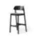Black Paged Nimm bar stool with upholstered seat and wooden backrest, studio view