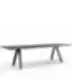 Minimalist long meeting table with a thin tabletop and metal A-frame legs.