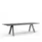 Minimalist long meeting table with a thin tabletop and metal A-frame legs.