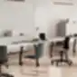 Juodos TIME kėdės konferencijų salėje.