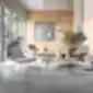 trys chic lounge a10f kėdės stilingoje biuro poilsio erdvėje su stikline siena, apvaliu staliuku ir kabančiais šviestuvais