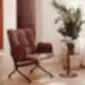 Snap 21H krėslas šalia staliuko ir augalo moderniame kambaryje