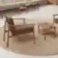 WUDI fotelis su rudos odos apmušalu, pastatytas poilsio zonoje