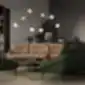 Nome poilsio foteliai ir sofa iš NOTI elegantiškame biuro interjere.
